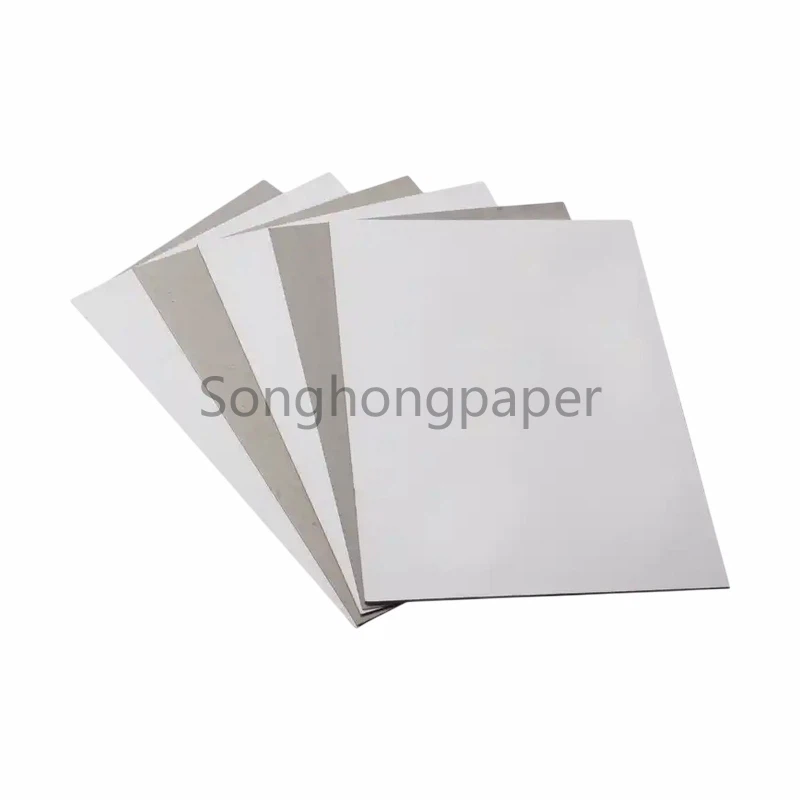 একপাশে সাদা ডুপ্লেক্স বোর্ড লেপা